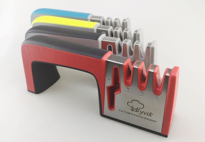 A Four-in-one Family Uses A Sharpener To Sharpen A Kitchen Knife - DropOnline.co