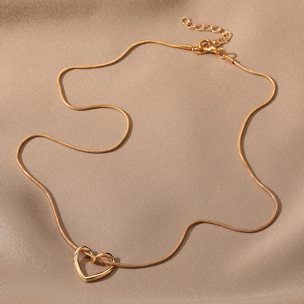 Niche Hollow Heart Necklace for Women - Delicate Cutout Heart Pendant - DropOnline.co
