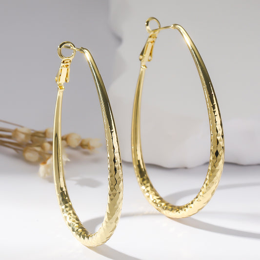 Golden Glossy Spring Fastener Egg-shaped Earrings Hypoallergenic Copper - DropOnline.co
