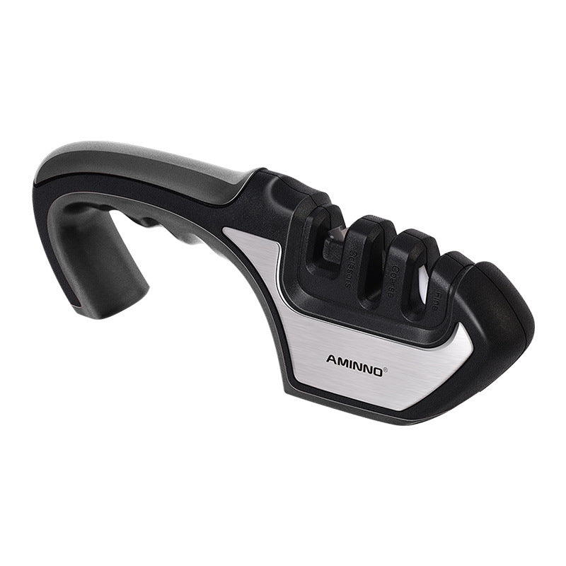 A Four-in-one Family Uses A Sharpener To Sharpen A Kitchen Knife - DropOnline.co