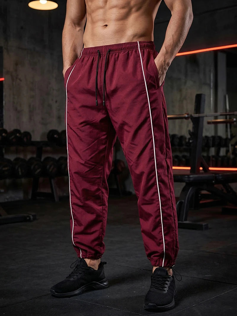 Men's Trendy Sporty Pants with Lines Gym Workout Running Trousers with Side Pockets Athletic Quick-Dry Breathable Sweatpants