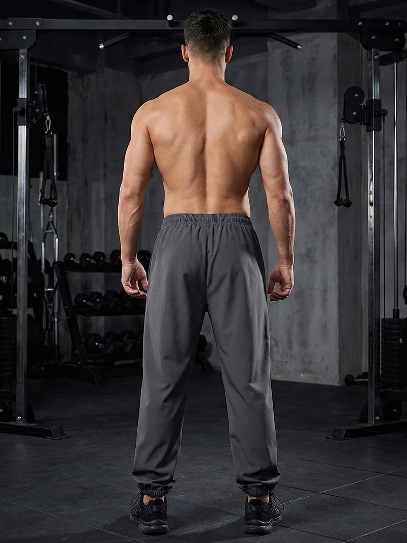 Men's Trendy Sporty Pants with Lines Gym Workout Running Trousers with Side Pockets Athletic Quick-Dry Breathable Sweatpants