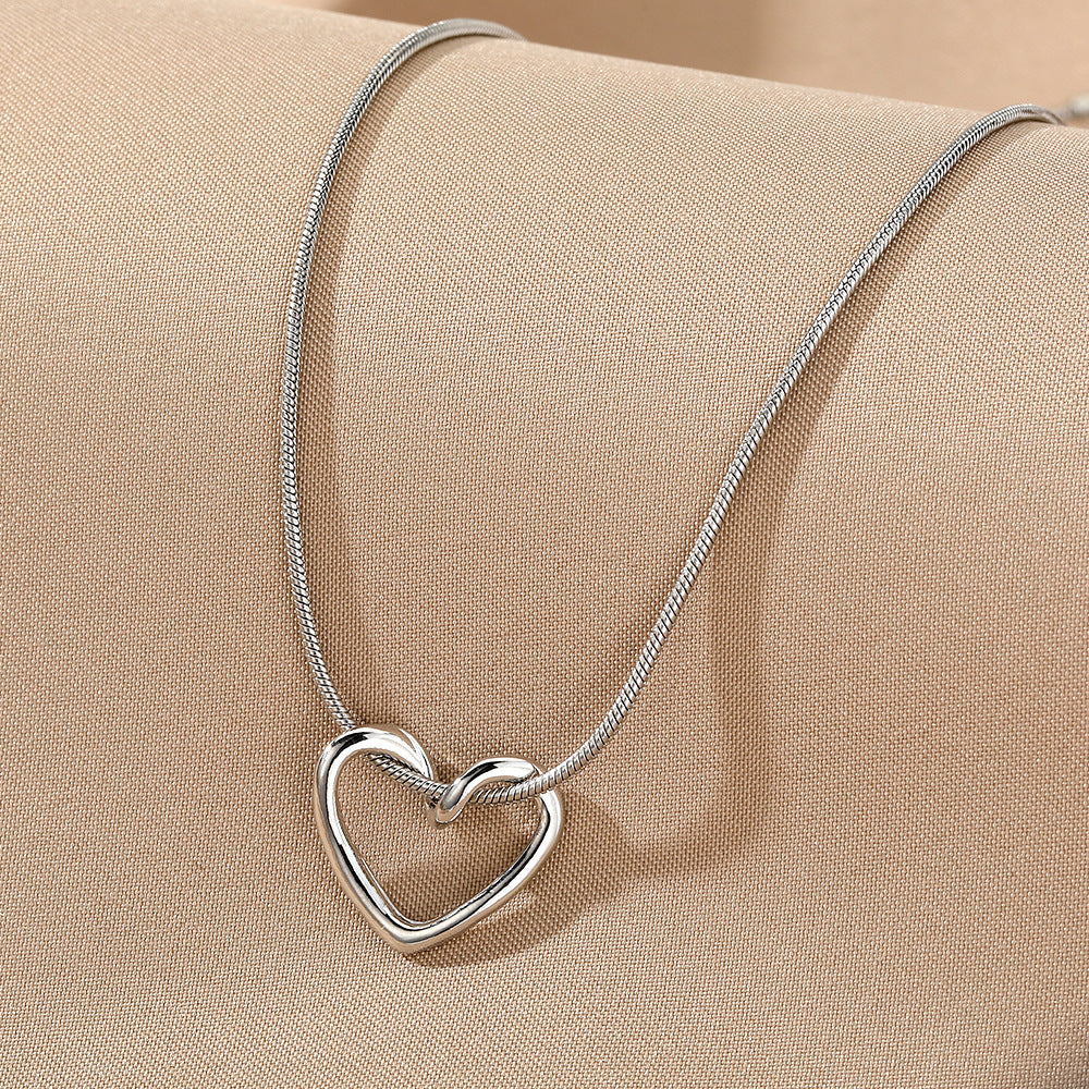 Niche Hollow Heart Necklace for Women - Delicate Cutout Heart Pendant - DropOnline.co