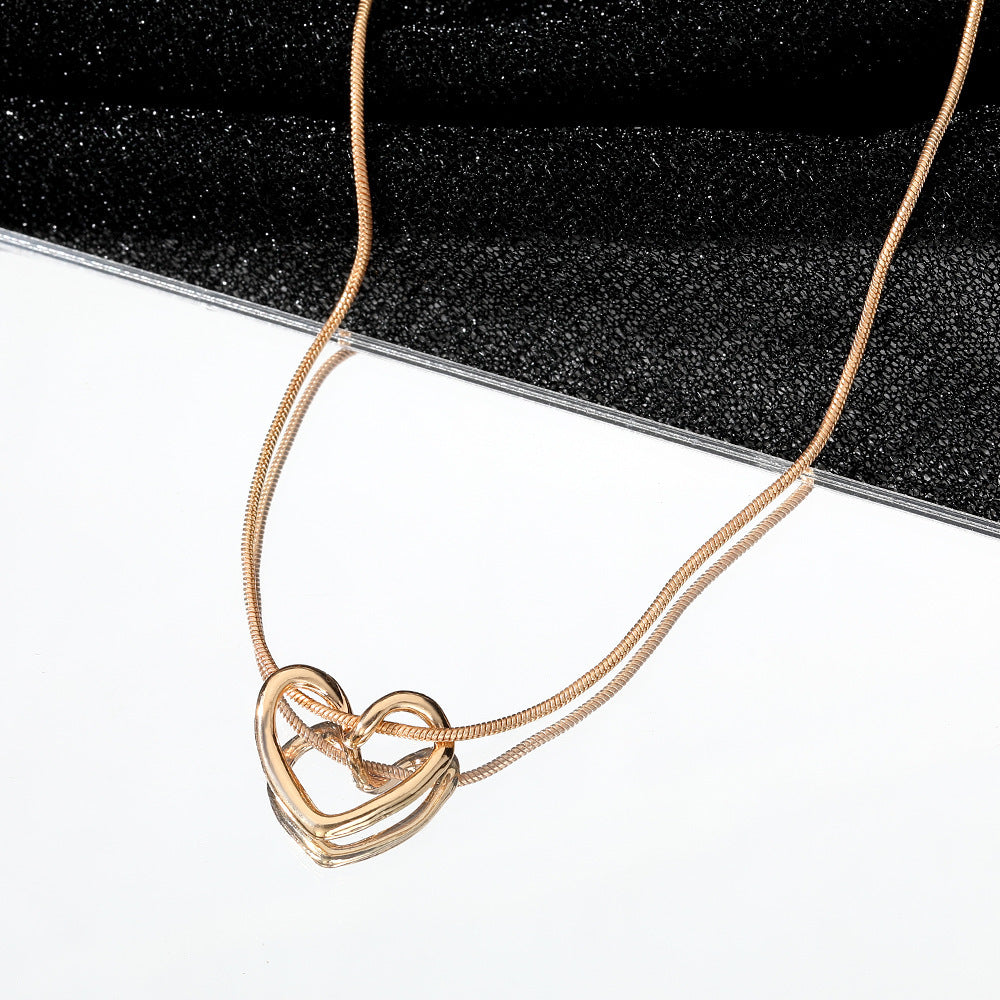 Niche Hollow Heart Necklace for Women - Delicate Cutout Heart Pendant - DropOnline.co